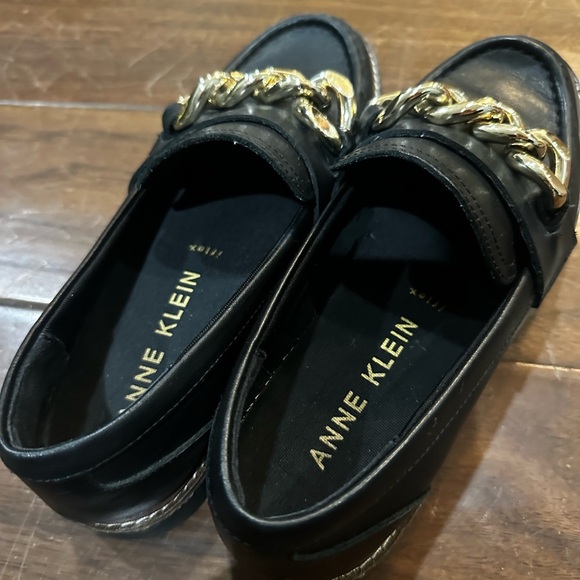 Anne Klein Black Slip-Ons with Gold Accent - Picture 2 of 3